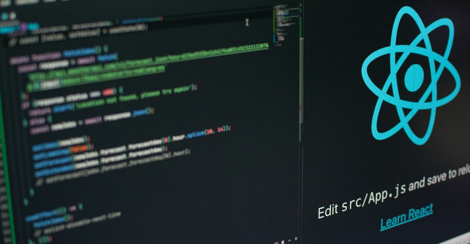 code editor with React.js boilerplate code on screen